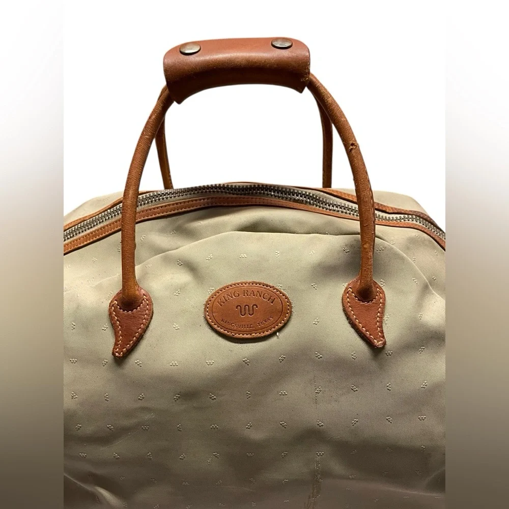 King Ranch Leather Trimmed Duffle Bag.